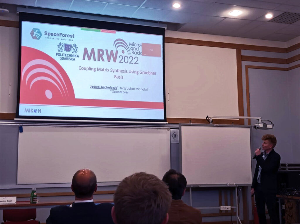 SpaceForest's engineer Jędrzej Michalczyk presenting at MRW 2022.