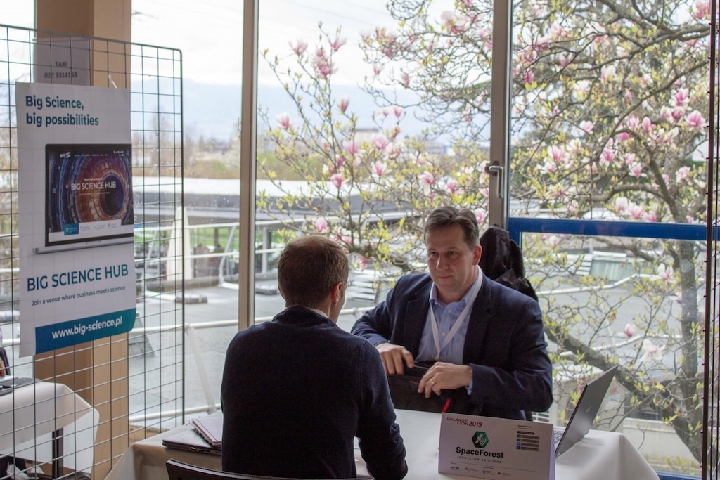 Business meeting between SpaceForest representative and client during Poland@CERN event.